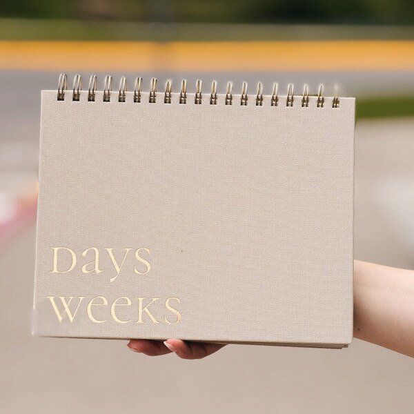 Taupe Fabric-Bound Weekly Desk Pad front cover